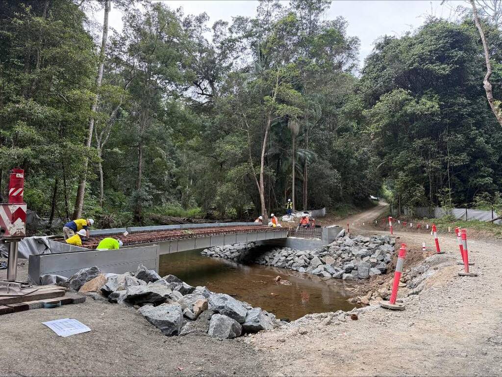 The open‑span bridge at Rowlands Creek allows natural water flow, improving movement for fish and other native species beneath the structure.