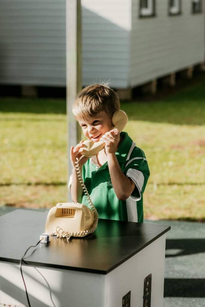 A student discovers what it once took to make a phone call, the Connected exhibition traces communication from early signals to the digital age.
